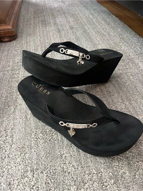 GUESS Black Wedge Flip-Flop Sandals with Silver Logo Accent